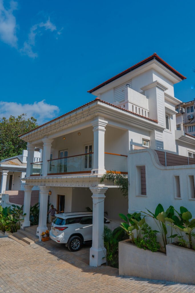 Exterior of a 2 floor villa with a terrace